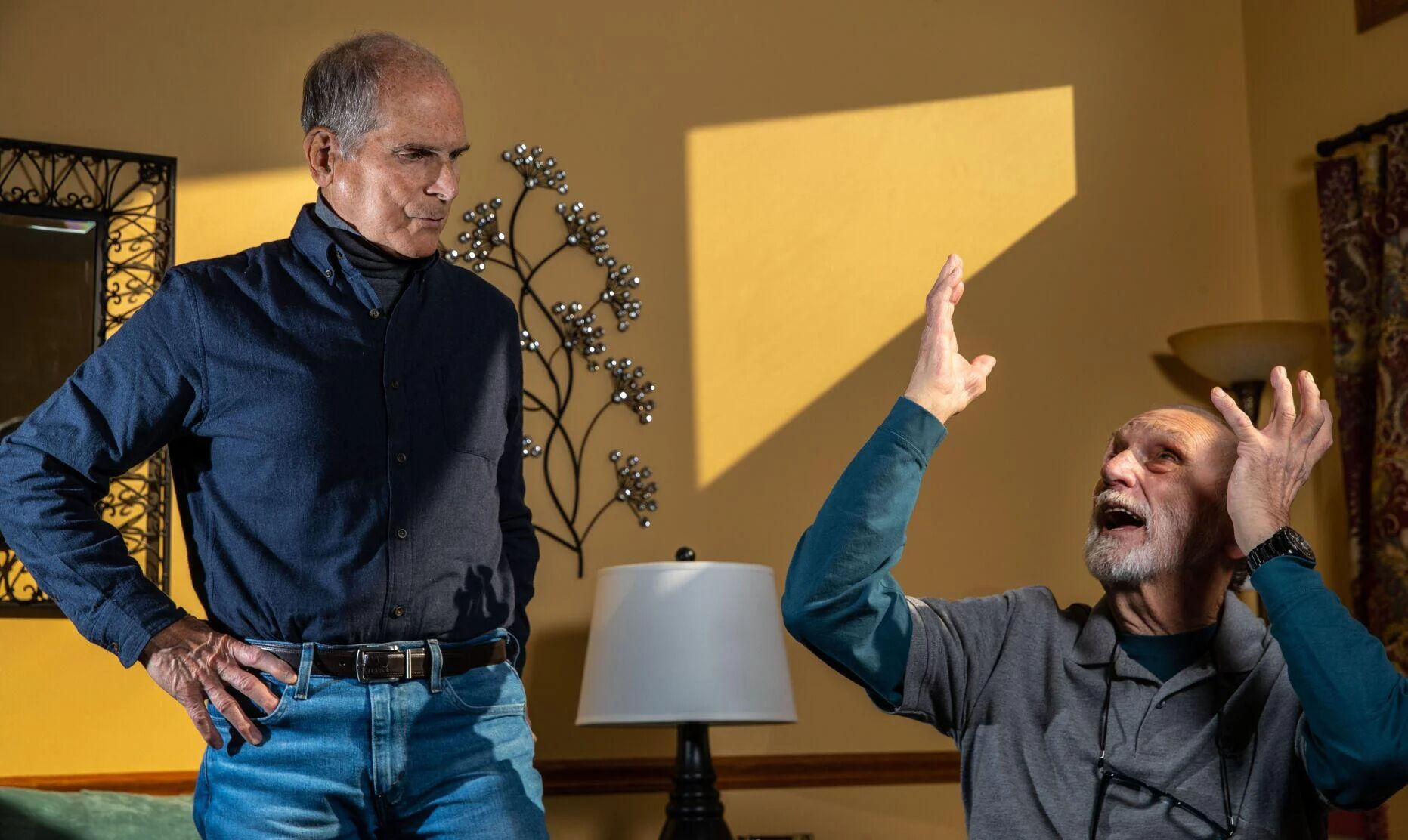 TWO MEN, KIRBY RIGHT, HANDS ABOVE HEAD .jpg